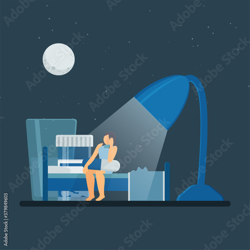 Woman sit on bed with capsule and water under desk lamp on the night metaphor of insomnia.