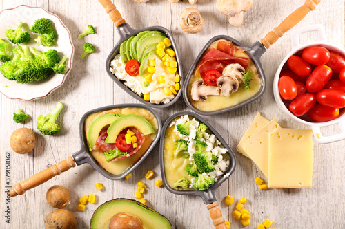 Photography set of raclette spoon with vegetables