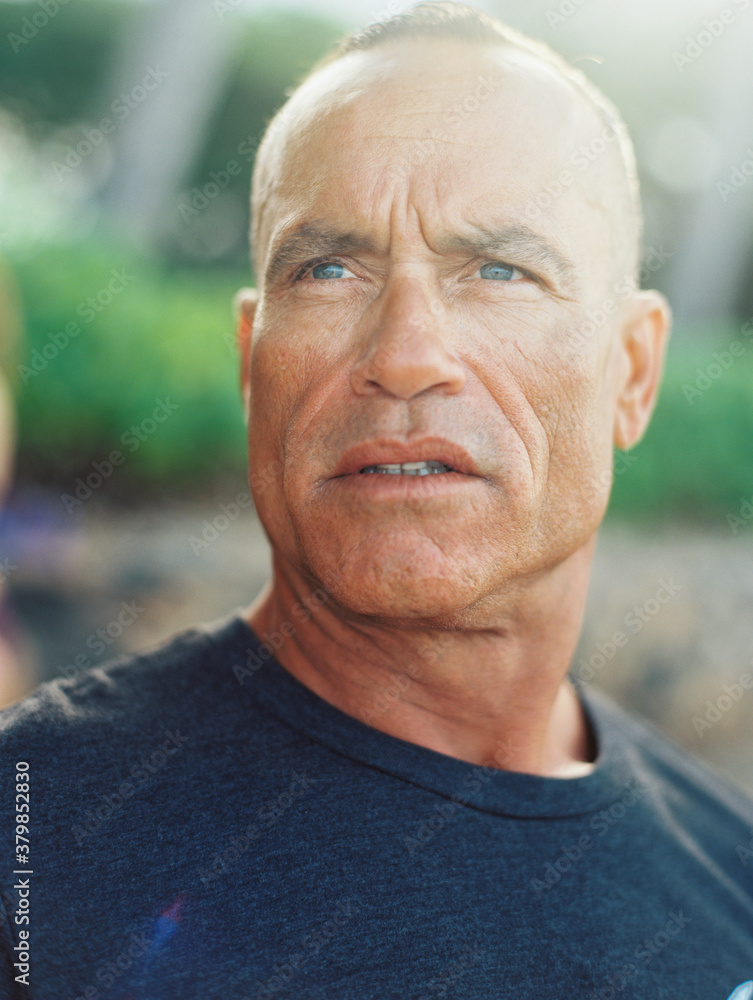handsome ripped athletic senior man with surfboard at ocean handsome ripped athletic senior man with surfboard at ocean