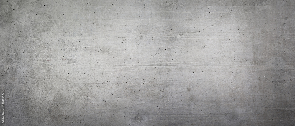 Texture of an old gray concrete wall as a background or wallpaper