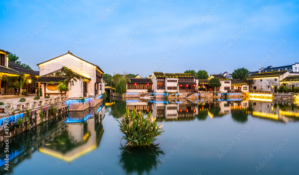 Obraz premium Ancient buildings by the river in Dangkou Ancient Town, Wuxi, Jiangsu, China