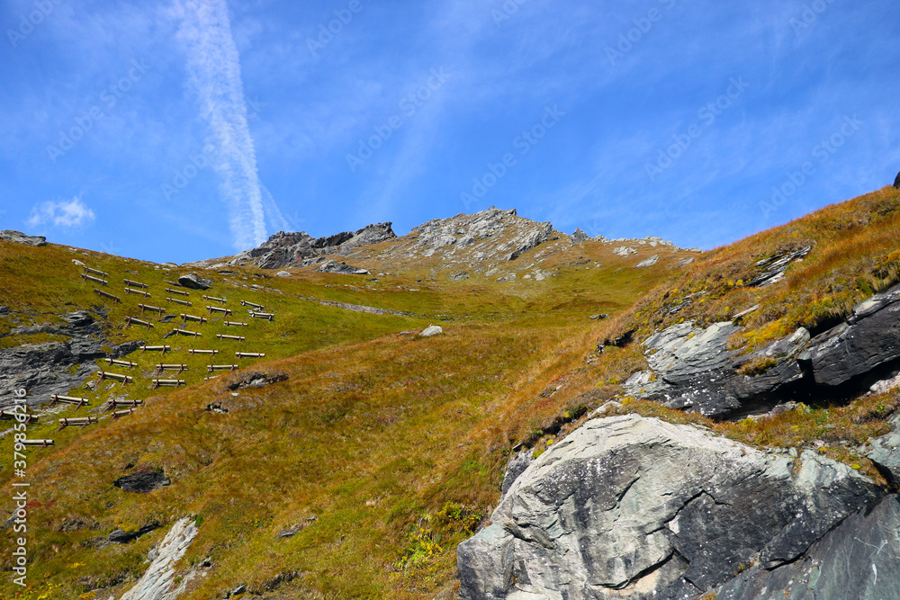 Mountain view on a alpinist route to Grossglockner rock summit in Austrian Alps.