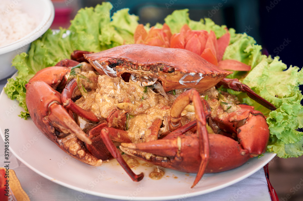 Steamed big Crab served in a White Plate Steamed big Crab served in a White Plate