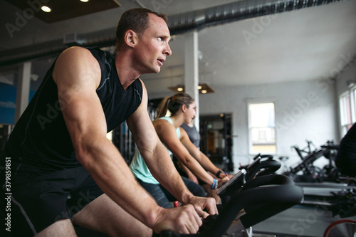 Group of people in spin class together photo