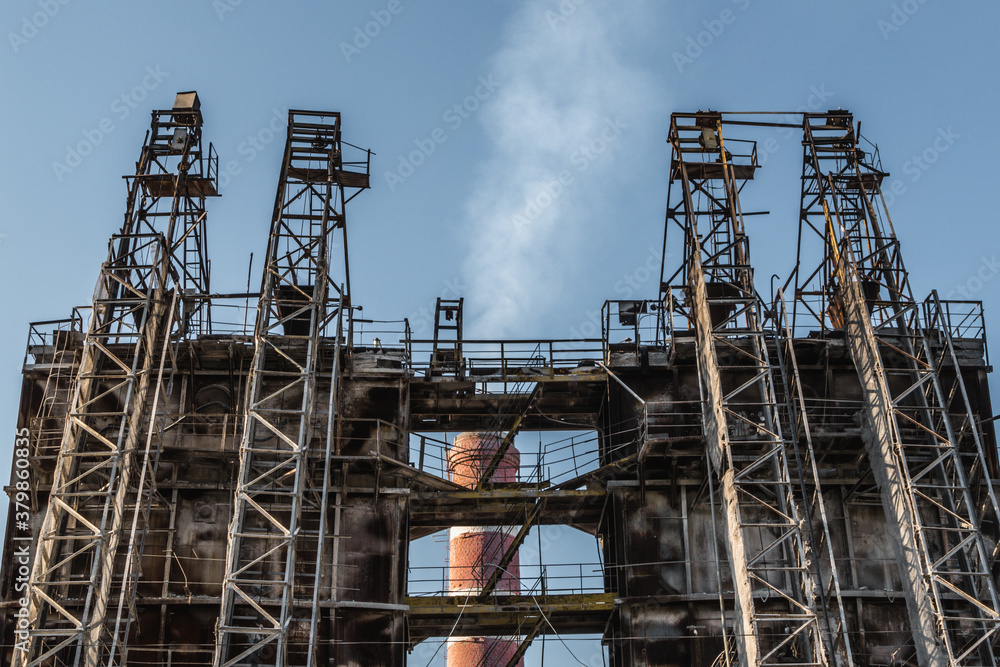 Smoke raising from factory chimney Smoke raising from factory chimney