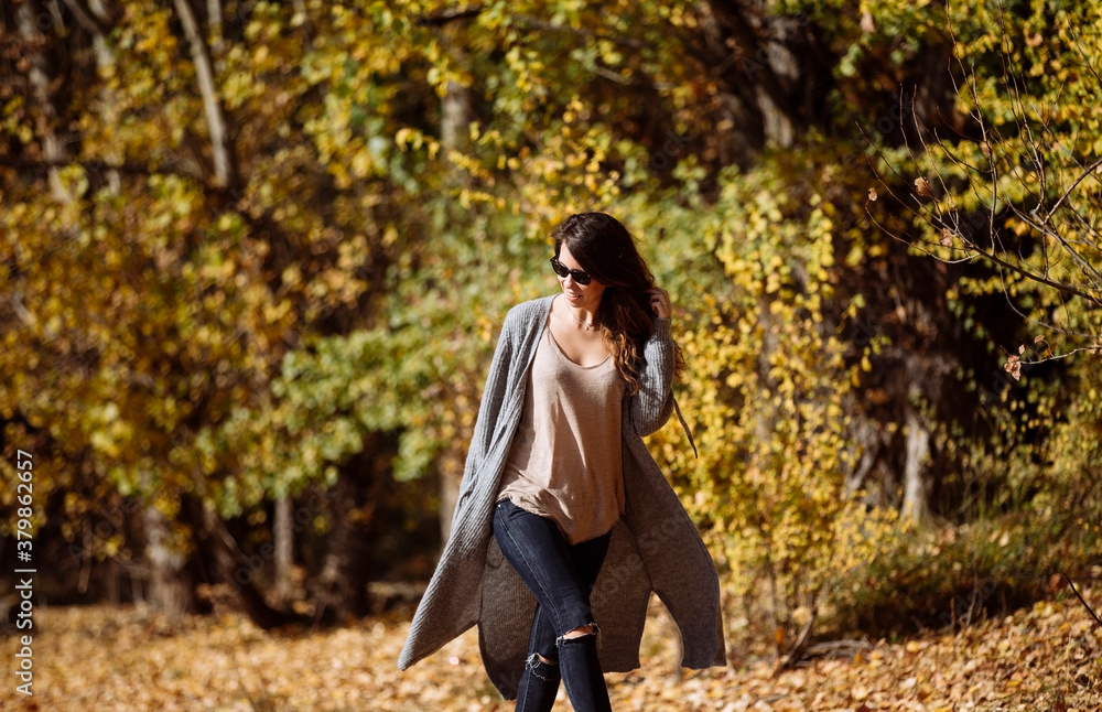 Woman taking a walk in the forest Woman taking a walk in the forest
