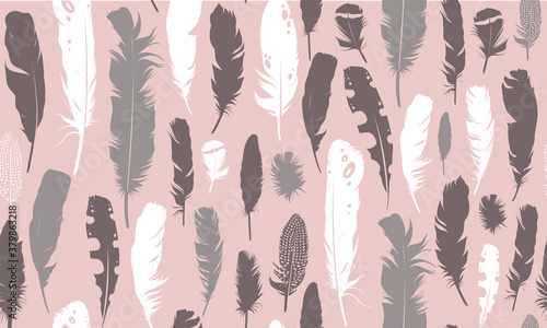 Seamless pink illustration with feathers. Natural vector pattern. Boho style. Simple silhouettes.