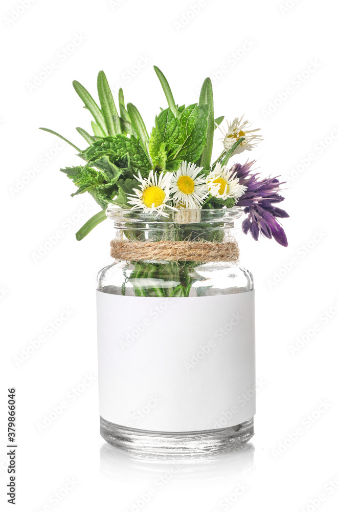 Bouquet of healing herbs in glass jar