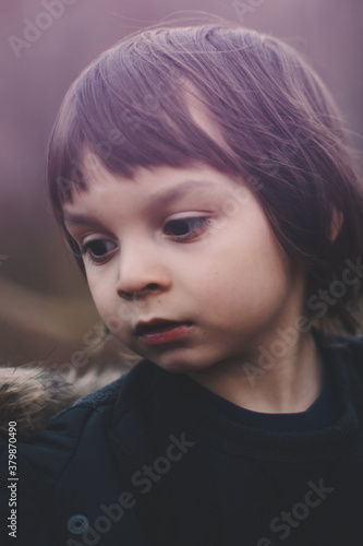 Headshot of a Young Boy Outside photo