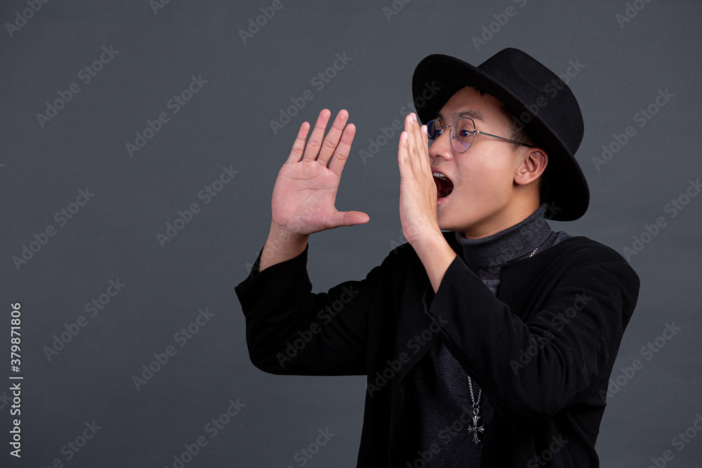 portrait of male model posing shout out acting on dark background portrait of male model posing shout out acting on dark background