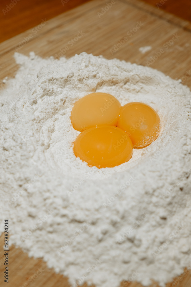 00 FLour and Egg Yolks ingredients for making fresh pasta 00 FLour and Egg Yolks ingredients for making fresh pasta