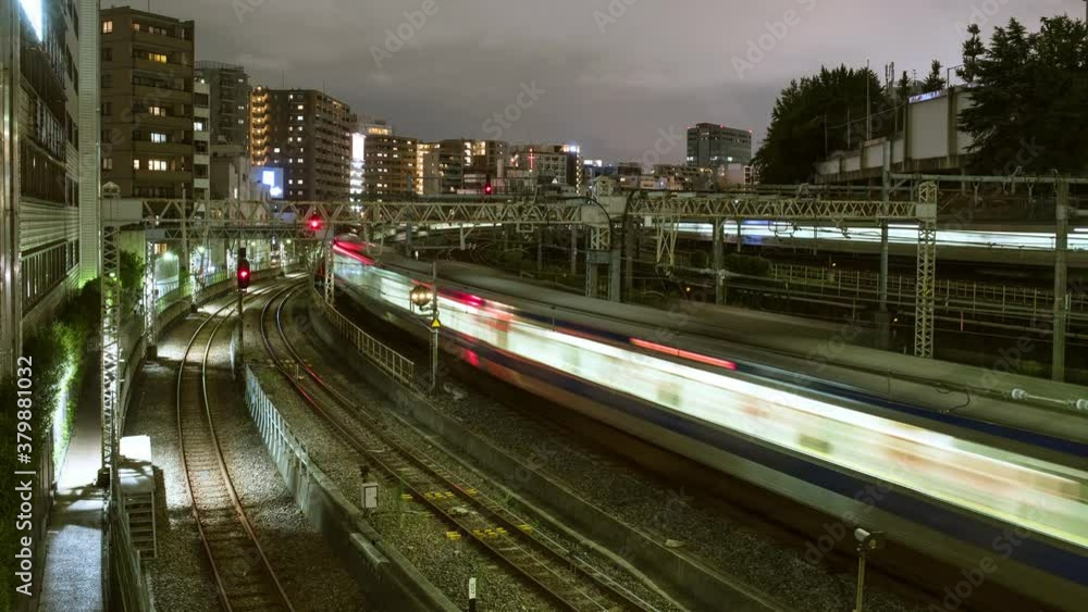 Time-lapse video of trains moving fast at night on busy multiple railway tracks in Tokyo, Japan 行き来する電車 様々な鉄道路線 タイムラプス 東京の夜景 Time-lapse video of trains moving fast at night on busy multiple railway tracks in Tokyo, Japan 行き来する電車 様々な鉄道路線 タイムラプス 東京の夜景