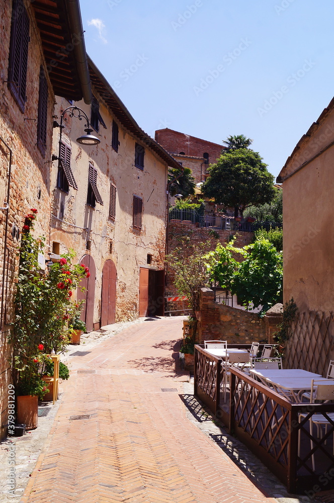 Typical street of the ancient medieval village of Certaldo, Tuscany, Italy