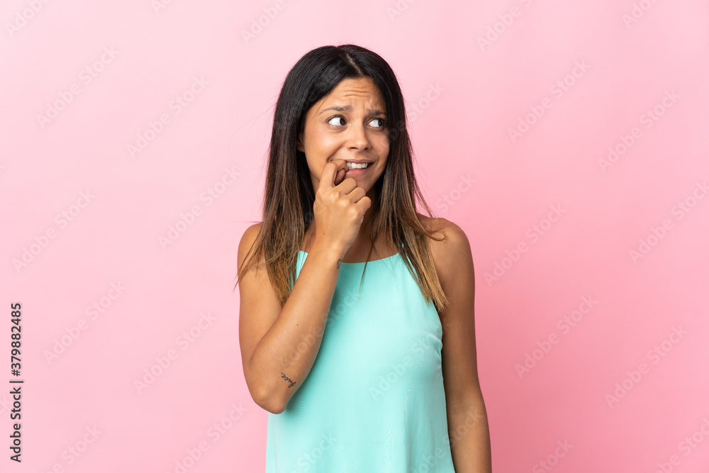 Caucasian girl isolated on pink background nervous and scared Caucasian girl isolated on pink background nervous and scared
