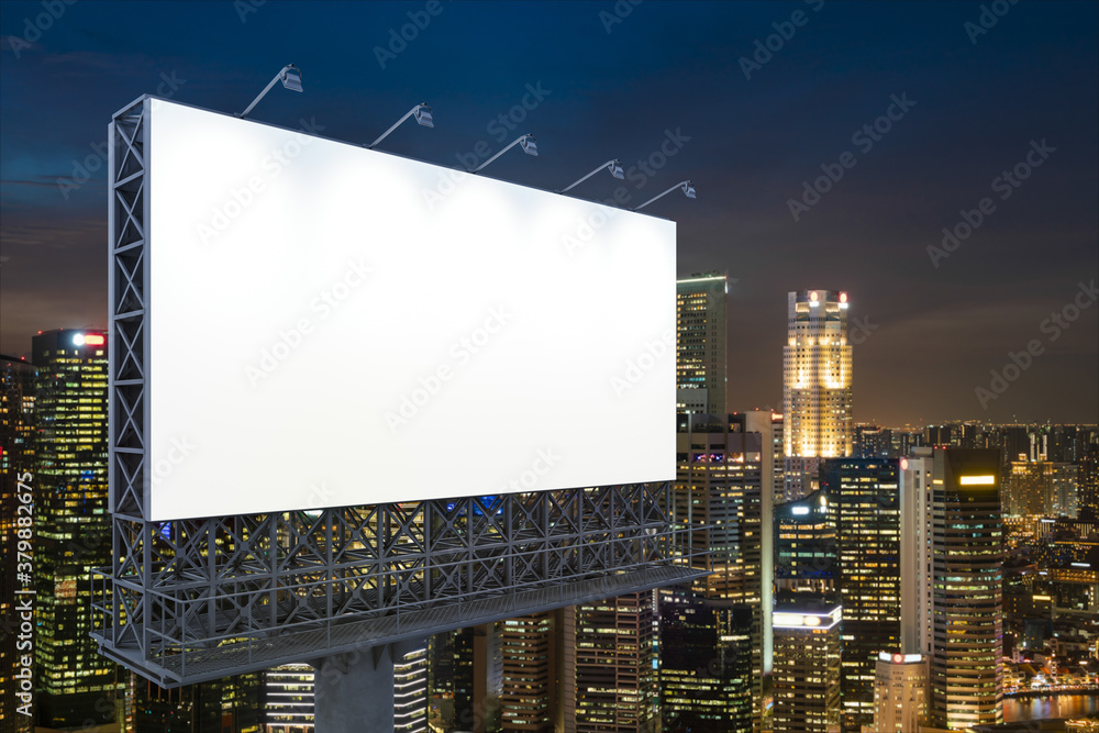 Blank white road billboard with Singapore cityscape background at night time. Street advertising poster, mock up, 3D rendering. Side view. The concept of marketing communication to sell idea. Blank white road billboard with Singapore cityscape background at night time. Street advertising poster, mock up, 3D rendering. Side view. The concept of marketing communication to sell idea.