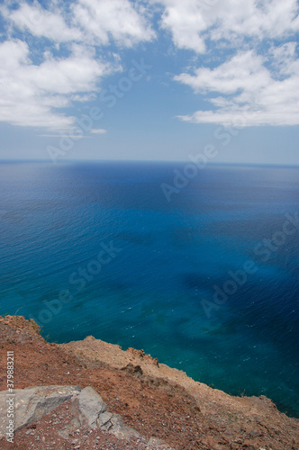 Rocks and blue ocean photo