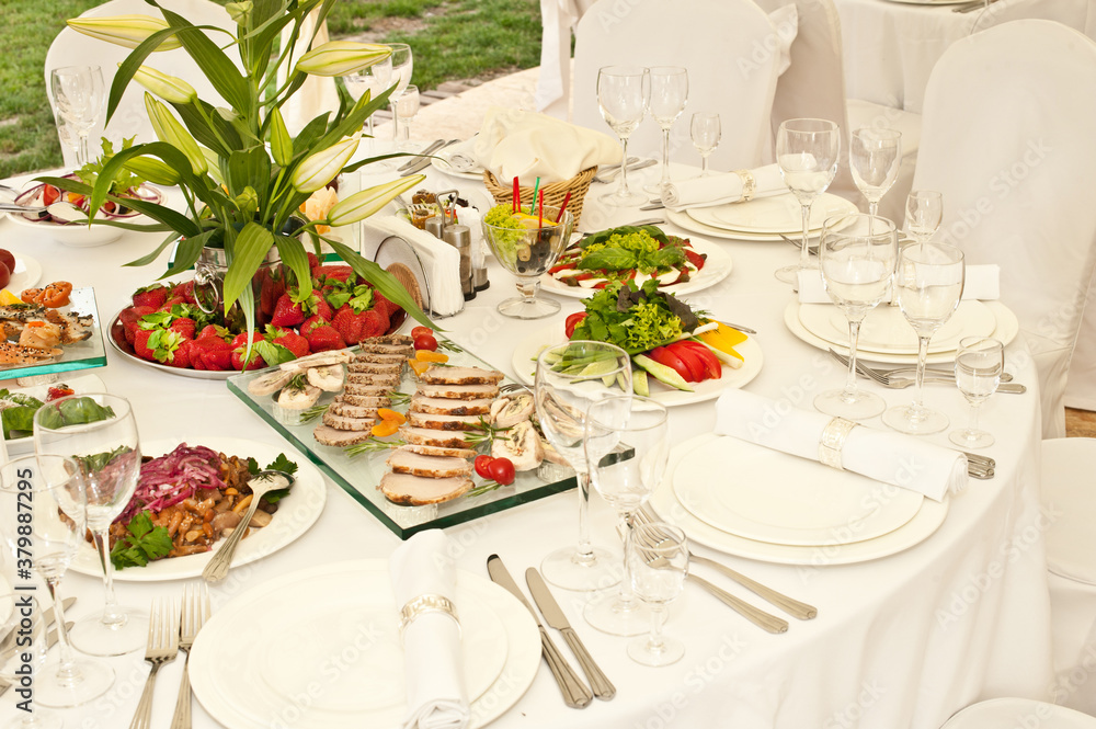 Banquet table for a holiday with festive dishes