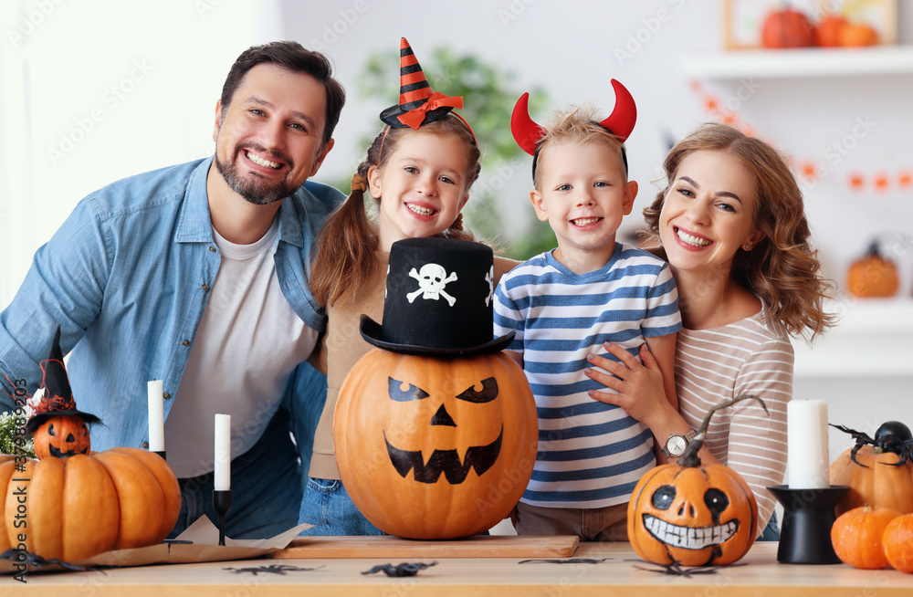 Fototapeta premium Delighted family during Halloween celebration.