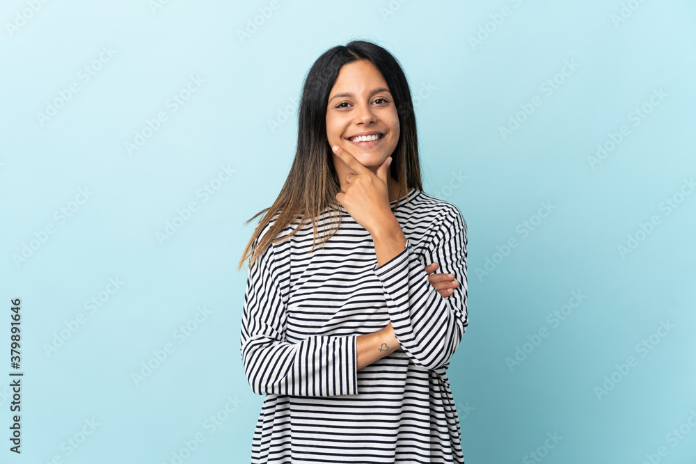 Caucasian girl isolated on blue background happy and smiling Caucasian girl isolated on blue background happy and smiling