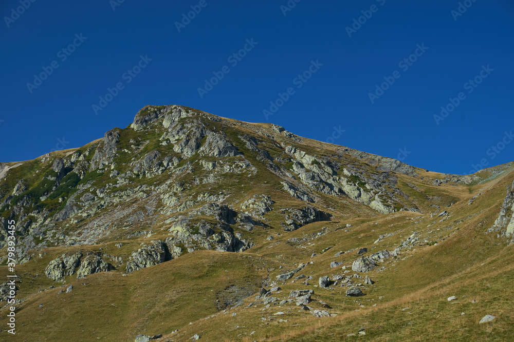 Alpine landscape with mountain peaks