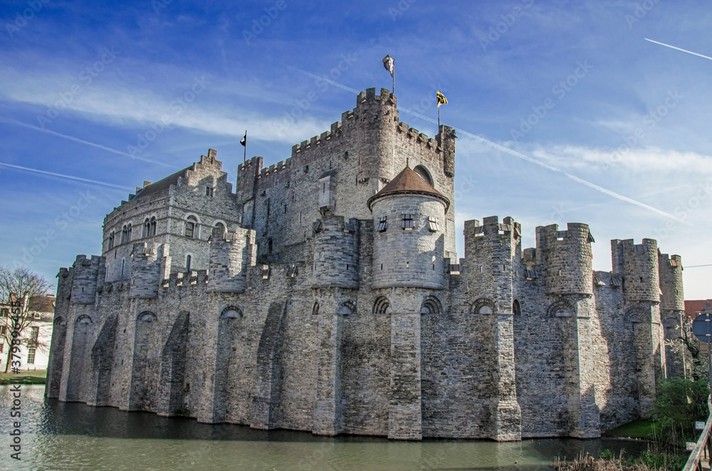 Castle of the Counts in Ghent, Belgium. Medieval castle Gravensteen surrounded by water