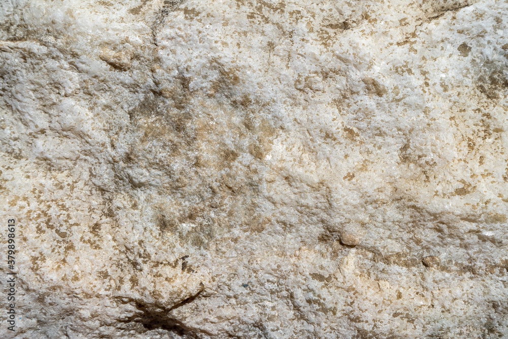 Natural background of light marble with a non-uniform texture Natural background of light marble with a non-uniform texture