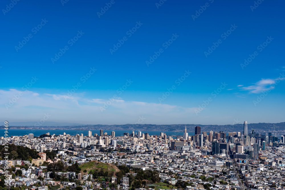 Panoramic shot of San Francisco Business District from Twin Peaks, California USA, March 30 2020 Panoramic shot of San Francisco Business District from Twin Peaks, California USA, March 30 2020