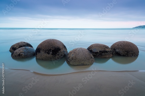 Fotografie Moeraki Boulders on the Koekohe beach, Eastern coast of New Zealand