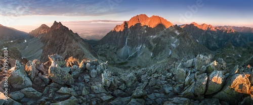 Fototapeta Naklejka Na Ścianę i Meble -  Scenic image of Fairytale mountains during sunset. The sunrise over a mountain in park High Tatras. Slovakia, Europe. Wonderful Autumn landscape. Picturesque view of nature Amazing natural Background