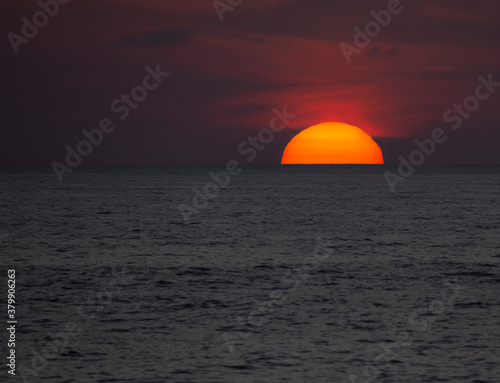 Serenity sunset background at the coastline. © bruno ismael alves