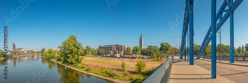 Panoramic view over downtown of Magdeburg, old town, Elbe river, bridges and Magnificent Cathedral at early Autumn, Germany, at sunny day and clear blue sky...