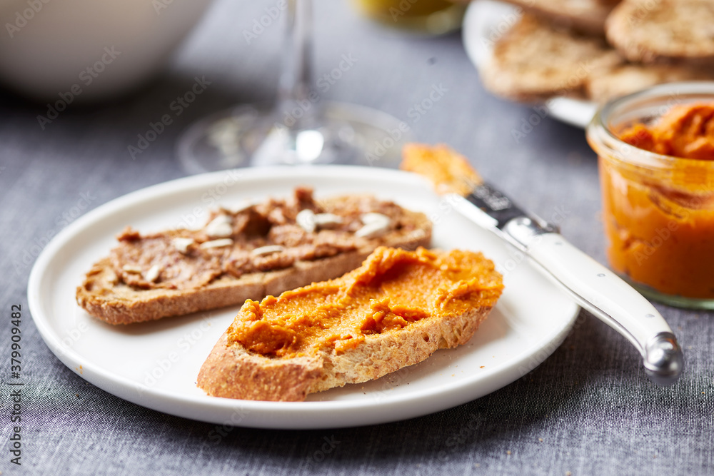 Delicious slices of bread with homemade pates. Delicious slices of bread with homemade pates.