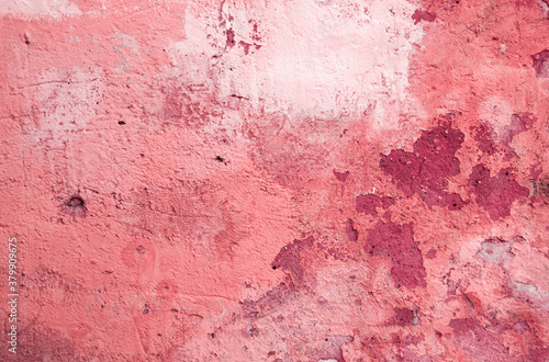 Pink plastered grunge wall