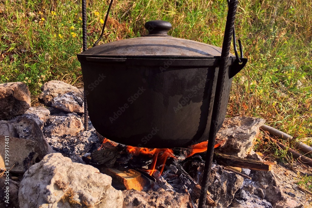 the cauldron on the bonfire, cooking in the nature