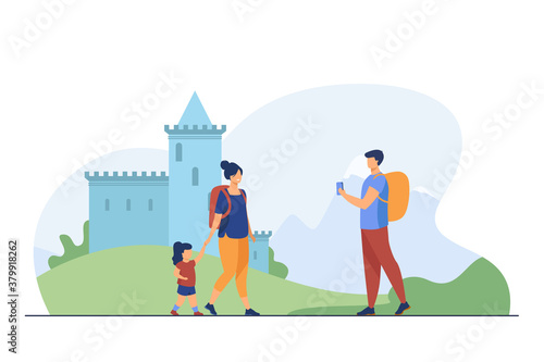 Couple of tourist with kid at landmark. People with backpacks taking pictures at castle flat vector illustration. Vacation, family travel concept for banner, website design or landing web page