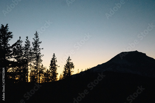 Mountain silhouette at sunset photo