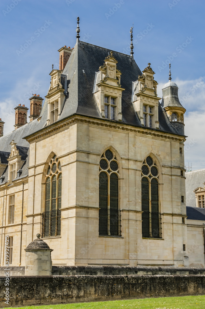 Obraz premium Architectural fragments of Cheteau Ecouen - historical chateau in city of Ecouen, north of Paris, France. Chateau built in 1538 – 1550.
