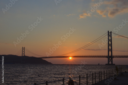 夕日と大橋 © tatata