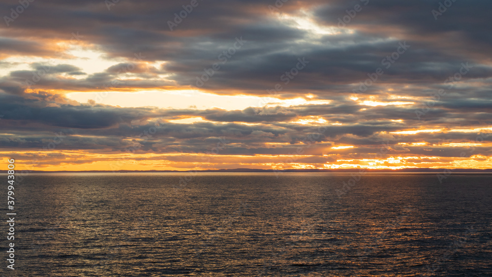 Beautiful sunset over the St Lawrence estuary, as seen from the Bic National park, Canada
