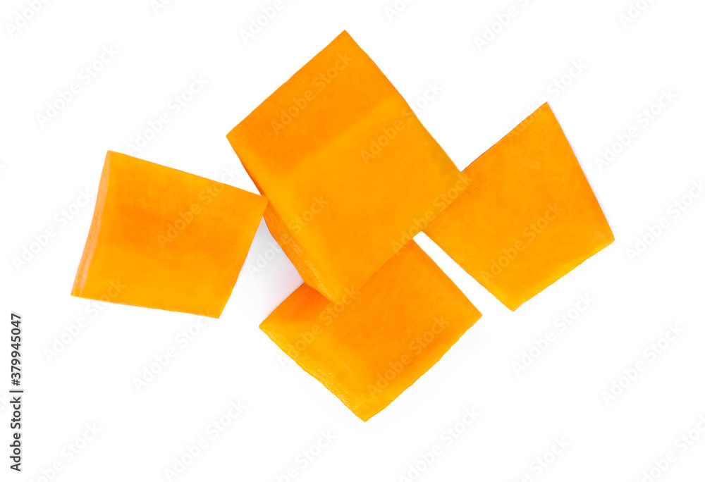 Pumpkin vegetable cube slices and seeds isolated on white background. Top view. Autumn Pumpkins chunks close-up Pumpkin vegetable cube slices and seeds isolated on white background. Top view. Autumn Pumpkins chunks close-up