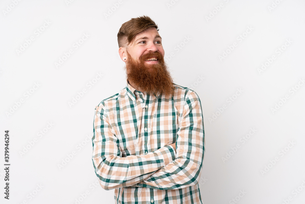 Redhead man with long beard over isolated white background with arms crossed and happy Redhead man with long beard over isolated white background with arms crossed and happy