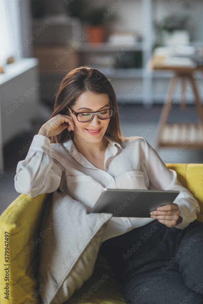 Businesswoman Reading from Tablet Businesswoman Reading from Tablet