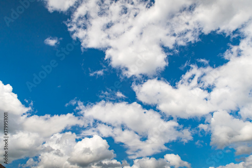 Fototapeta Naklejka Na Ścianę i Meble -  Blue sky background with a tiny clouds