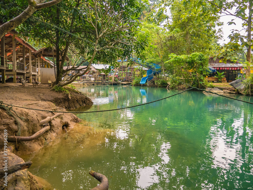 Fototapeta Vangvieng/lao-10 Dec 2017:Beautiful nature and clear water of Blue lagoon at pukham cave vangvieng city Lao.Vangvieng City The famous holiday destination town in Lao.