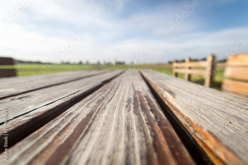 boards of a wooden table outside