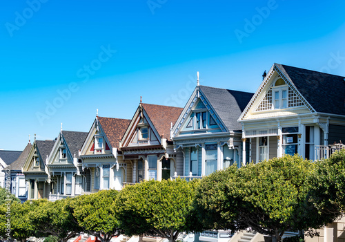 The Painted Ladies of San Francisco, California, USA. View from Alamo Square at twilight, San Francisco. Victoria houses in san francisco