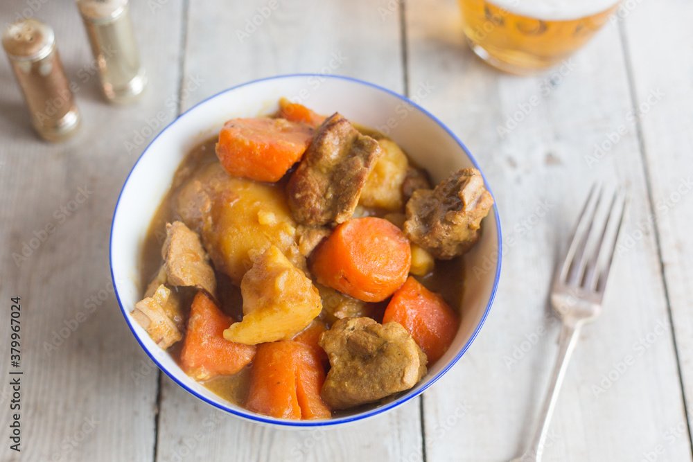 A rustic pork and vegetable curry. A rustic pork and vegetable curry.