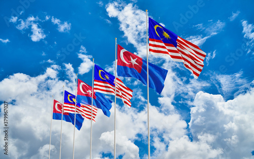Waving flags of Johor also know as Johore, is a state of Malaysia in the south of the Malay Peninsula photo
