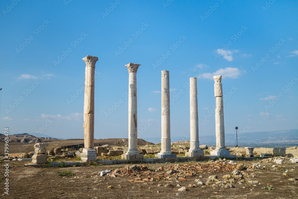 Remains of street columns in city Laodicea, Denizli, Turkey. All of them made in Corinthian order, left one made of marble. All city is included in UNESCO Tentative Heritage List Remains of street columns in city Laodicea, Denizli, Turkey. All of them made in Corinthian order, left one made of marble. All city is included in UNESCO Tentative Heritage List