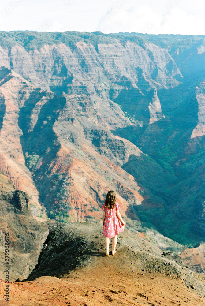 Woman standing on edge of Canyon Woman standing on edge of Canyon